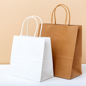 White Paper Carrier bags with twisted handles - GM Packaging (UK) Ltd 